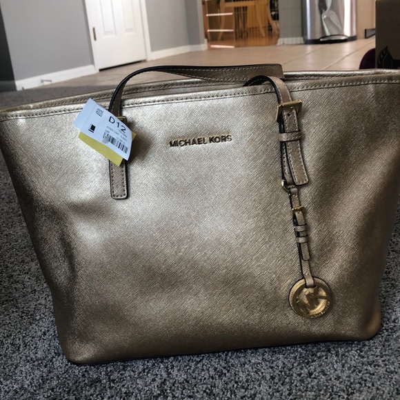Michael Kors Handbags - SOLD